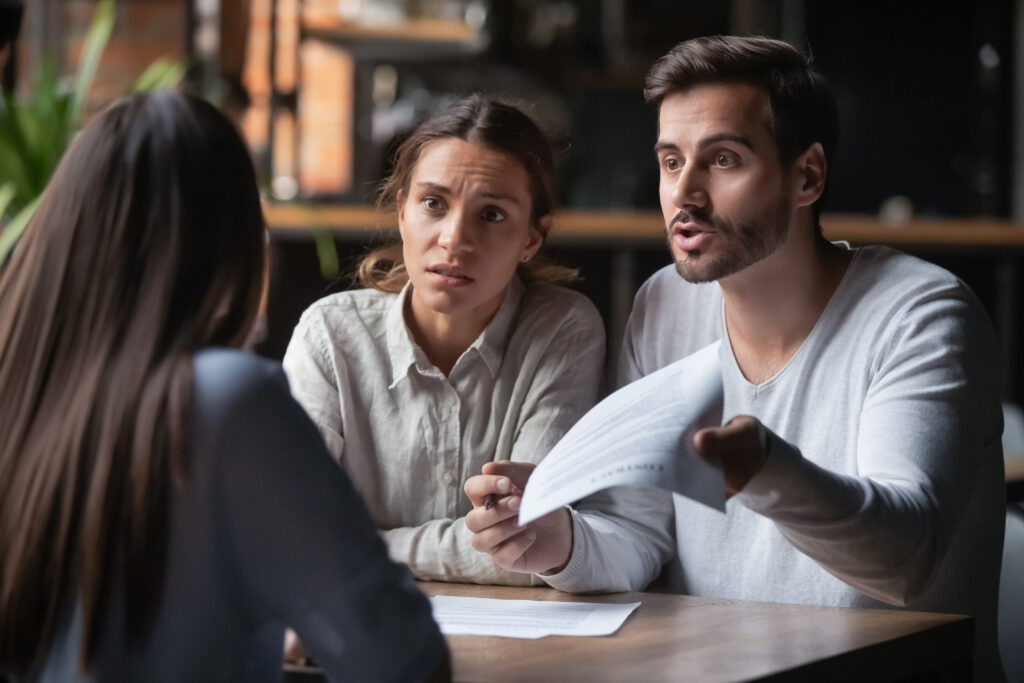 Couple meeting with an attorney